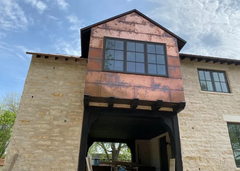 Copper metal panel facade on a stone building for Metal Roof Coating in Orinda